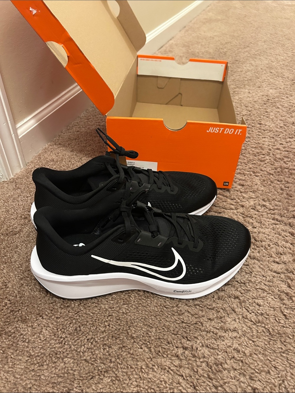 Nike Men’s Black Sneakers with White Swoosh